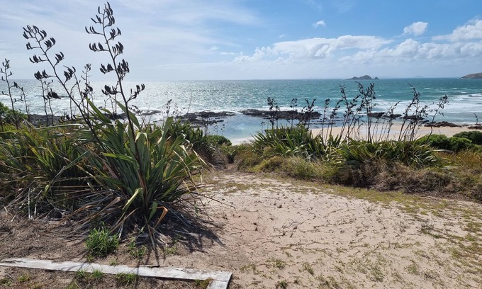 Houhora House | Experience Henderson Bay: Oceanfront Bliss & Top Ratings