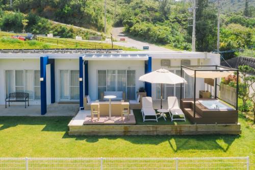 Nakama Villa | Oceanfront Bliss at Hermit Hills Okinawa - Rated 9/10