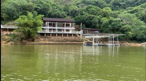 Prado House | Tranquil Cabin Retreat on Private Island in Prado Tolima