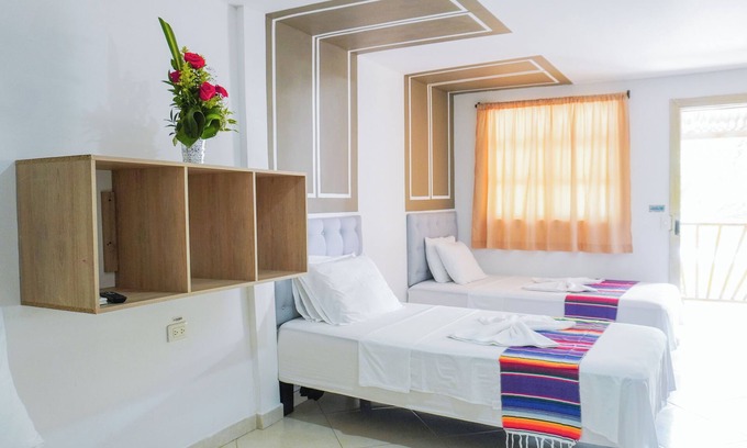 Covenas Hotel | Beachfront Quintuple Room with Pool and Ocean Views