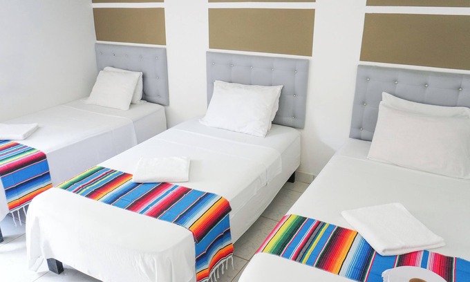 Covenas Hotel | Cozy Triple Room Steps from the Beach with Ocean View