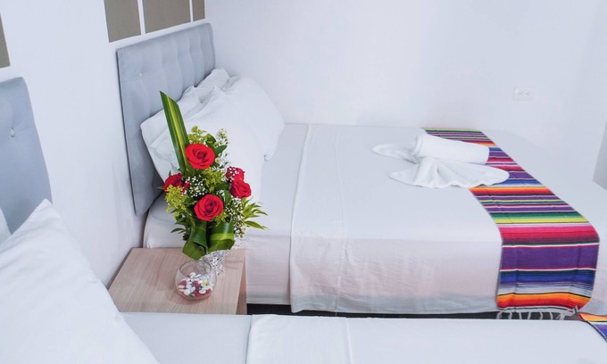 Covenas Hotel | Cozy Oceanfront Triple Room Steps from the Beach