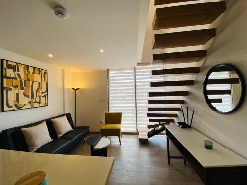 Cuenca Apartment | Modern Duplex with Balcony and Terrace - Pet Friendly Stay