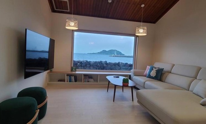 Hallim House | Relax at Hay Day Jeju: Oceanfront Retreat with Pool Access