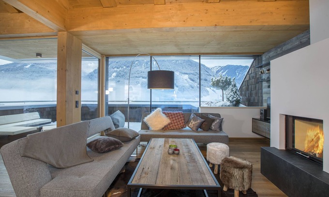 Schonbach House | Elegant Penthouse in Kitzbühel Alps with Sauna & Spa
