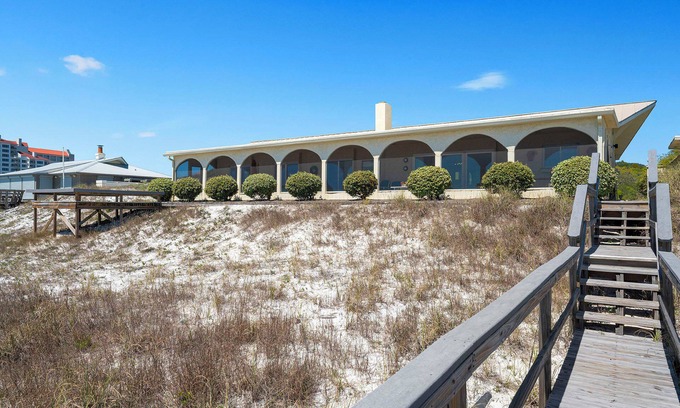 Four Mile Village House | Cozy Beachfront Rental with Fireplace and Ocean Views