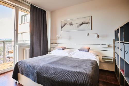 Prague 9 Apartment | High-Sky O2 arena Apartment with garage parking and AC