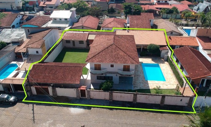 Peruibe House | Prime Location Suites with Pool and Ocean Views Await You