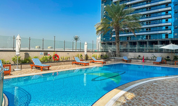 Jumeirah Lake Towers Apartment | Relax at HiGuests: Lake View with Pool & Ocean Access
