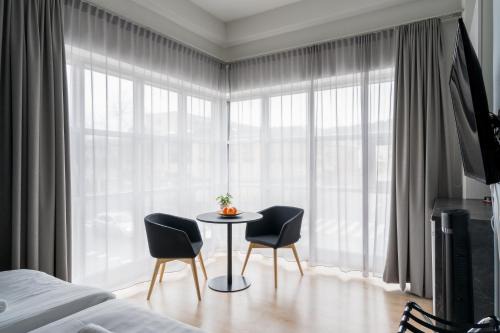 Lohja Hotel | Cozy Hiisi Hotel Lohja: Family & Pet Friendly Stay
