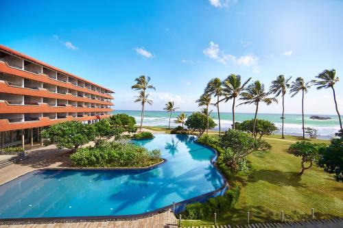 Hikkaduwa Resort | Elegant Hikka Tranz by Cinnamon: Oceanfront Bliss Awaits