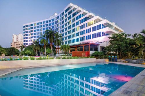 El Laguito Resort | Unforgettable Stays at Hilton Cartagena: 4-Star Luxury Awaits