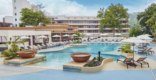 Port of Spain Hotel | Relax at Hilton Trinidad & Conference Centre with Ocean Views