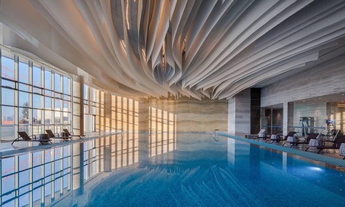 Han Yang Hotel | Stylish Stay at Hilton Wuhan Riverside with Pool Access