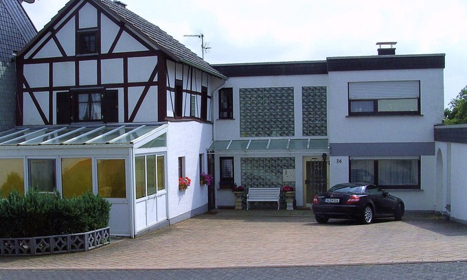 Reifferscheid House | Historic Half-Timbered House with Pool & Ocean Views