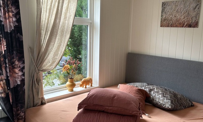 Alesund Apartment | Historic Ground Floor Retreat in Downtown with Pet-Friendly Perks