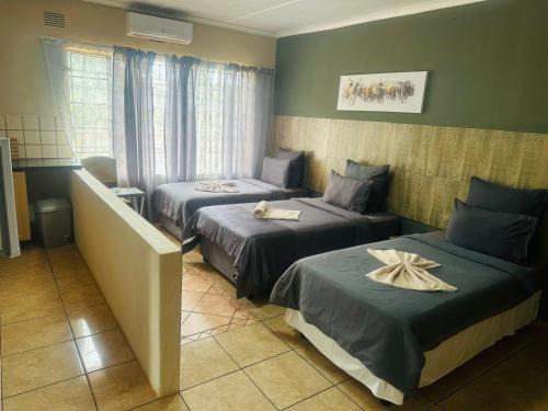 Hluhluwe Hotel | Discover Hluzu Guest House: Family-Friendly Stay, Rated 9/10