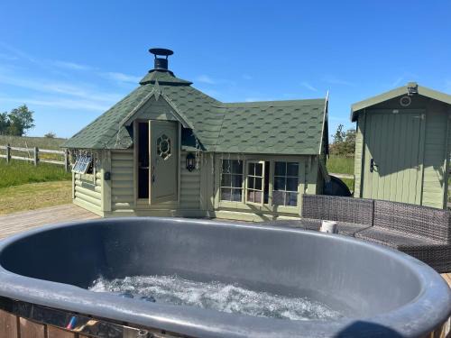 Accrington Other | Experience the Enchantment of Hobbit Hut with Hot Tub Access