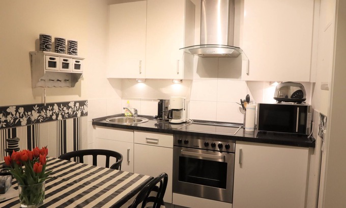 Fleckeby Apartment | Exceptional Black and White Hotel: Pet-Friendly Comfort