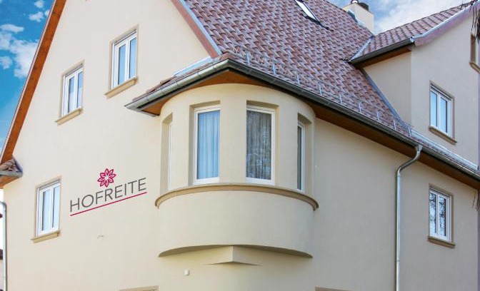 Heppenheim Apartment | Experience Oceanfront Bliss at Hofreite - Rated 9.5/10