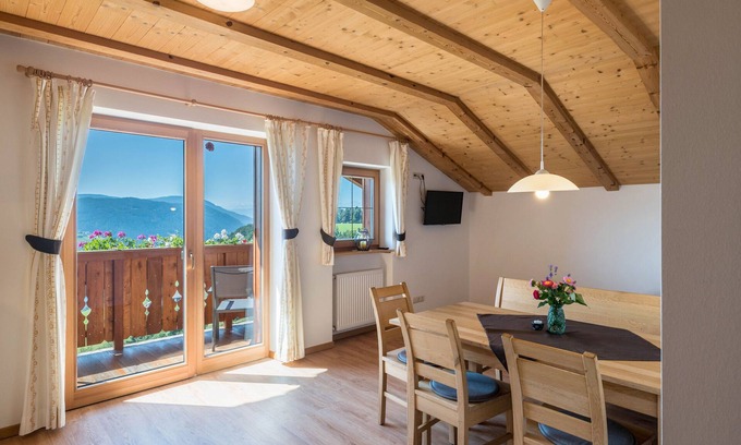 Fie allo Sciliar Apartment | Mountain View Holiday Apartment with Shared Garden & Wi-Fi