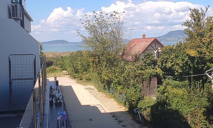 Balatonfenyves Apartment | Modern Waterfront Apartment with Air Conditioning & Ocean Views
