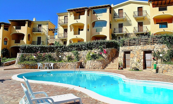 Pittulongu Apartment | Explore Bia de Bados B5: Oceanfront with Pool & Wi-Fi