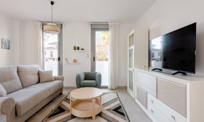 Genil Apartment | Cozy "Carmela Suites" Apartment with Wi-Fi & Spa Access