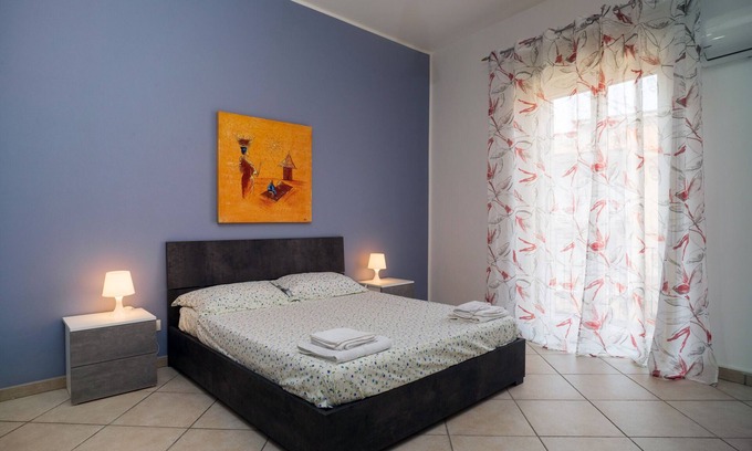 Monte Po-Nesima-San Leone-Rapisardi Apartment | Cozy Holiday Apartment "Casa Cairoli" with Ocean View & A/C