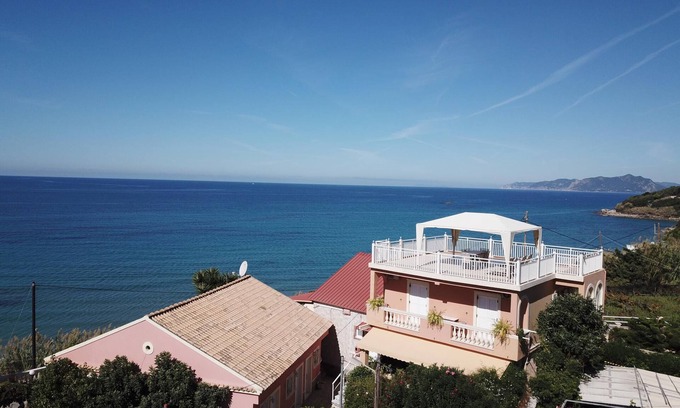 Skala Apartment | Beachfront Apartment with Pool & Terrace in Paramonas