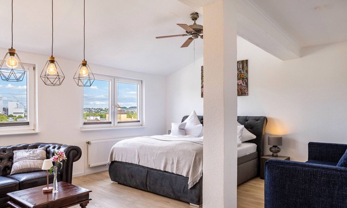 Bettenhausen Apartment | Holiday Apartment 'Grimms Suite' with Balcony, Wi-Fi and Air Conditioning