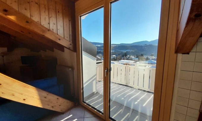 Brez Apartment | Cozy Attic Apartment with Wooden Beams and Spa Amenities