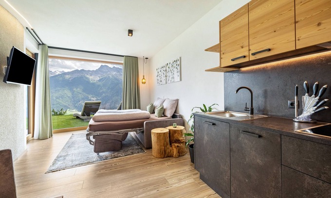 Lasa Apartment | Mountain View Holiday Apartment with Garden & Wi-Fi