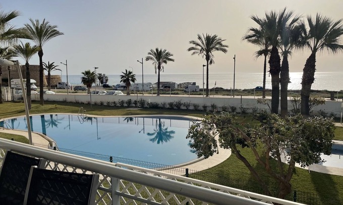 Garrucha Apartment | Holiday Apartment "Primera Linea Marina Del Faro" with Sea View, Shared Pool & Wi-Fi