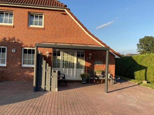 Strackholt House | Cozy Holiday Apartment Strackholt for Families and Pets