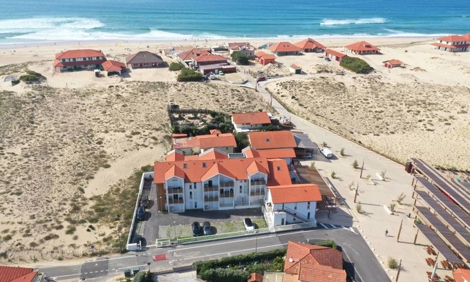 Cote d'Argent Apartment | Cozy Oceanfront Apartment with Lake Views and Breakfast
