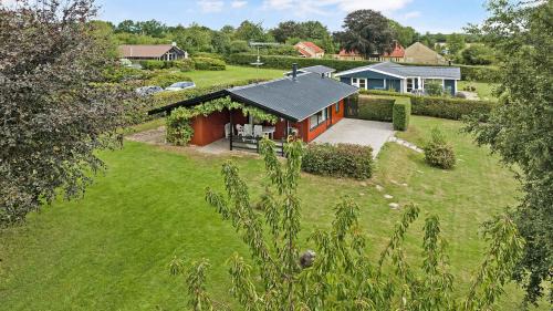 Langeland Municipality House | Charming Holiday Home from 1978 with Child-Friendly Amenities