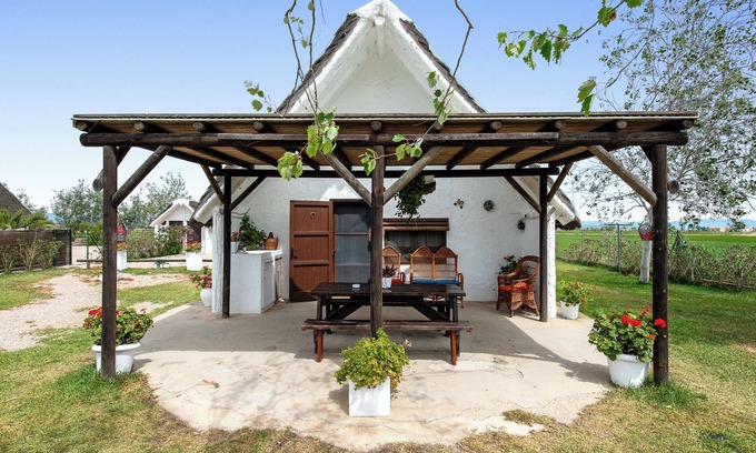 Deltebre House | Relax at Barraca Gran: Private Pool & Lake View Escape