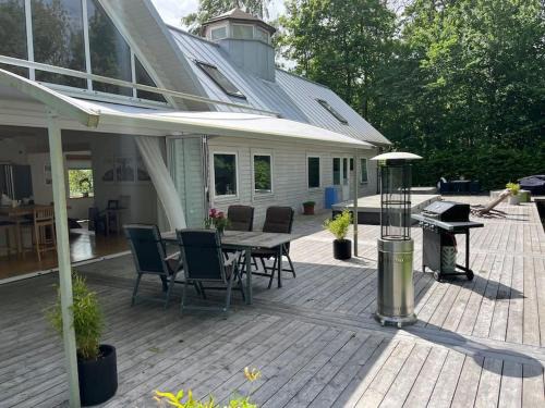 Bastad Villa | Family-Friendly Retreat at Lugn och Lummig Oasis W27