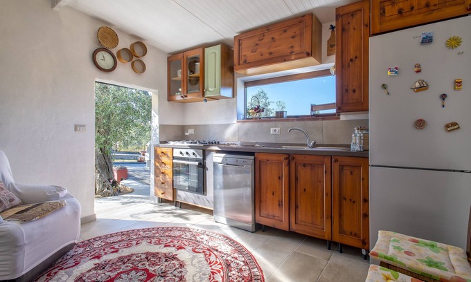 Sassari House | Cozy Holiday Home 'Casa Rina' with Garden and Ocean View