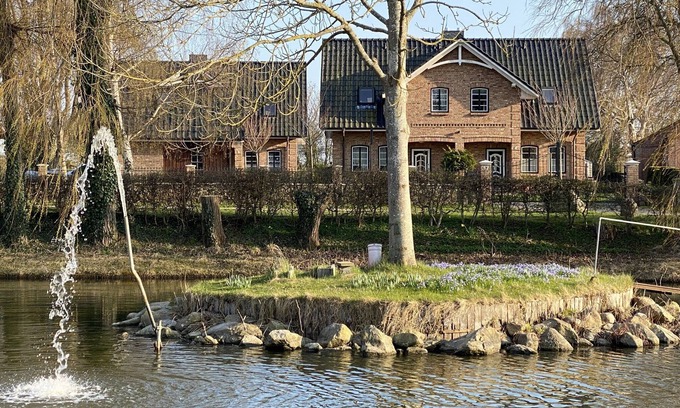 Kopendorf House | Holiday Home 'Haus Am Dorfteich A E-Laden Möglich' with Private Terrace, Shared Garden and Wi-Fi