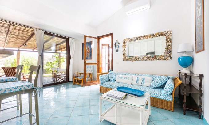 Villasimius House | Holiday Home 'Holiday In Villasimius' with Sea View, Wi-Fi and Air Conditioning