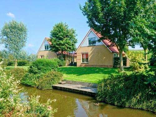 Andijk Villa | Holiday Home in Netherlands near Scenic Parks