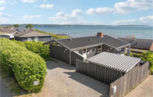 Hvidbjerg Strand House | Welcoming Home In Brkop With Free Wifi & Child-Friendly Amenities