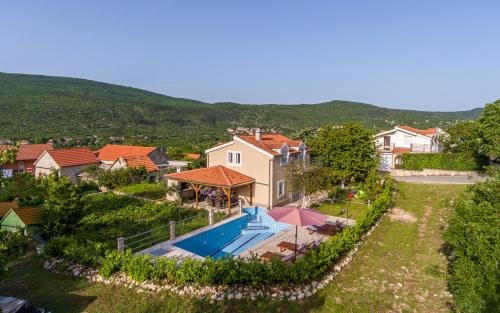 Slivno House | Memories and Joy: Oceanfront Retreat with Pool & Breakfast
