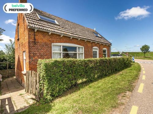 Nieuwvliet House | Cozy Holiday Home in Nieuwvliet Bad Steps from the Seabeach