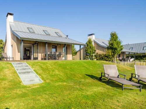 Tholen House | Relax at Holiday Home Oesterdam Resort with Oceanfront Views