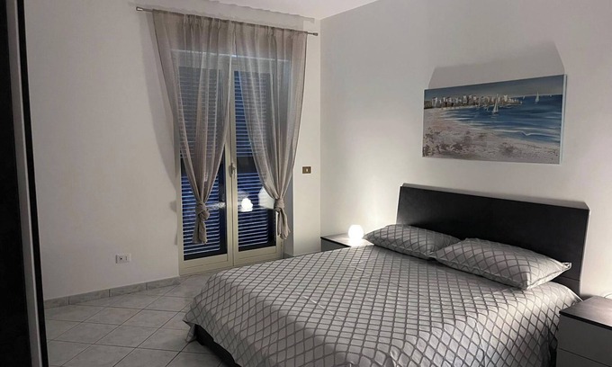 Isola Sacra House | Enjoy Oceanfront Living at Titina's House with Balcony