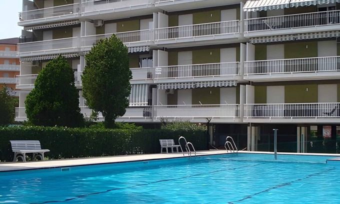 Porto Santa Margherita Apartment | Holiday apartment Apartment with swimming pool surrounded by a garden