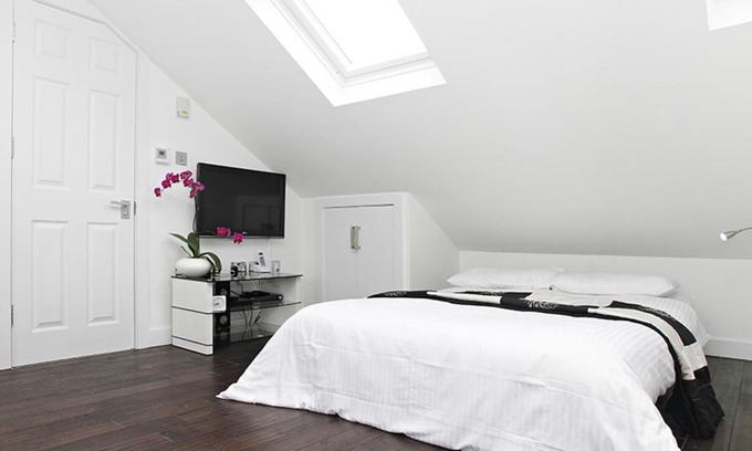 Hammersmith Broadway Apartment | Discover Holiday Lets London - Family-Friendly with Pool